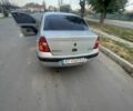 Сірий Рено Кліо, об'ємом двигуна 1.4 л та пробігом 260 тис. км за 2002 $, фото 5 на Automoto.ua