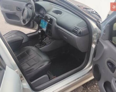 Серый Рено Клио, объемом двигателя 1.4 л и пробегом 328 тыс. км за 3000 $, фото 11 на Automoto.ua