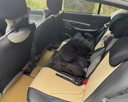 Серый Рено Клио, объемом двигателя 1.39 л и пробегом 196 тыс. км за 3850 $, фото 6 на Automoto.ua