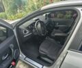 Серый Рено Клио, объемом двигателя 1.6 л и пробегом 198 тыс. км за 6700 $, фото 2 на Automoto.ua