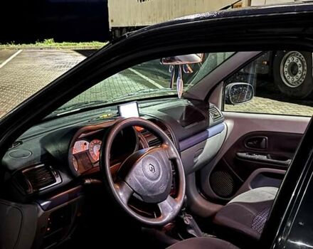 Сірий Рено Кліо, об'ємом двигуна 1.4 л та пробігом 291 тис. км за 2870 $, фото 54 на Automoto.ua