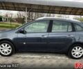 Серый Рено Клио, объемом двигателя 1.2 л и пробегом 165 тыс. км за 4900 $, фото 1 на Automoto.ua