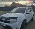 Белый Рено Дастер, объемом двигателя 1.6 л и пробегом 231 тыс. км за 7800 $, фото 1 на Automoto.ua