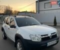 Білий Рено Дастер, об'ємом двигуна 1.45 л та пробігом 205 тис. км за 8800 $, фото 1 на Automoto.ua