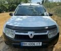 Білий Рено Дастер, об'ємом двигуна 1.45 л та пробігом 200 тис. км за 7800 $, фото 1 на Automoto.ua