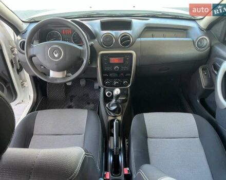 Белый Рено Дастер, объемом двигателя 2 л и пробегом 93 тыс. км за 9600 $, фото 14 на Automoto.ua