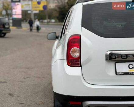 Белый Рено Дастер, объемом двигателя 2 л и пробегом 93 тыс. км за 9600 $, фото 7 на Automoto.ua