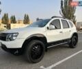 Белый Рено Дастер, объемом двигателя 1.6 л и пробегом 142 тыс. км за 11000 $, фото 2 на Automoto.ua