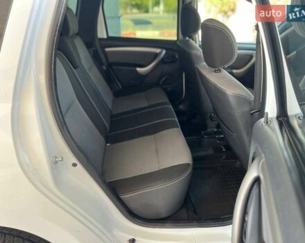 Белый Рено Дастер, объемом двигателя 2 л и пробегом 93 тыс. км за 9600 $, фото 22 на Automoto.ua