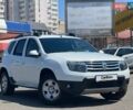 Білий Рено Дастер, об'ємом двигуна 2 л та пробігом 93 тис. км за 9900 $, фото 1 на Automoto.ua