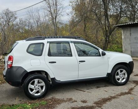 Білий Рено Дастер, об'ємом двигуна 1.5 л та пробігом 74 тис. км за 10300 $, фото 6 на Automoto.ua