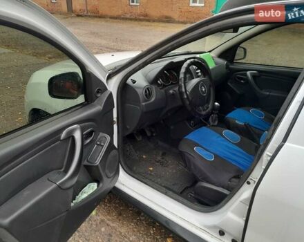 Белый Рено Дастер, объемом двигателя 1.46 л и пробегом 238 тыс. км за 9000 $, фото 3 на Automoto.ua