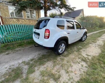 Белый Рено Дастер, объемом двигателя 1.46 л и пробегом 292 тыс. км за 11500 $, фото 2 на Automoto.ua