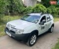 Белый Рено Дастер, объемом двигателя 1.46 л и пробегом 350 тыс. км за 6900 $, фото 1 на Automoto.ua