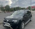 Черный Рено Дастер, объемом двигателя 1.46 л и пробегом 140 тыс. км за 8900 $, фото 1 на Automoto.ua