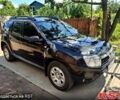 Черный Рено Дастер, объемом двигателя 1.5 л и пробегом 220 тыс. км за 7500 $, фото 1 на Automoto.ua