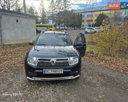Черный Рено Дастер, объемом двигателя 1.6 л и пробегом 94 тыс. км за 8900 $, фото 1 на Automoto.ua
