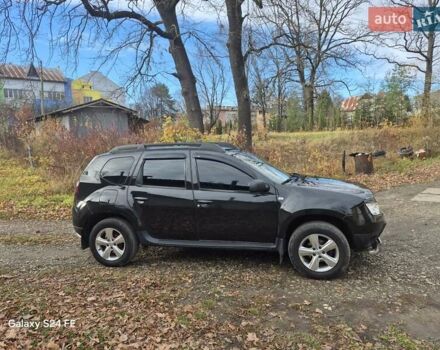 Черный Рено Дастер, объемом двигателя 1.6 л и пробегом 94 тыс. км за 8900 $, фото 12 на Automoto.ua