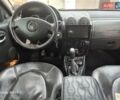Черный Рено Дастер, объемом двигателя 1.6 л и пробегом 94 тыс. км за 8900 $, фото 3 на Automoto.ua