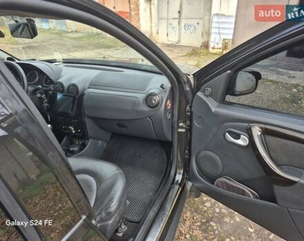 Черный Рено Дастер, объемом двигателя 1.6 л и пробегом 94 тыс. км за 8900 $, фото 2 на Automoto.ua