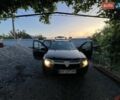 Черный Рено Дастер, объемом двигателя 1.6 л и пробегом 200 тыс. км за 5600 $, фото 1 на Automoto.ua