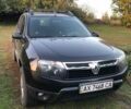 Чорний Рено Дастер, об'ємом двигуна 2 л та пробігом 98 тис. км за 9393 $, фото 1 на Automoto.ua