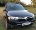 Черный Рено Дастер, объемом двигателя 2 л и пробегом 98 тыс. км за 9440 $, фото 1 на Automoto.ua
