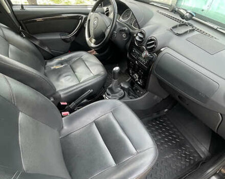 Черный Рено Дастер, объемом двигателя 1.6 л и пробегом 84 тыс. км за 9000 $, фото 11 на Automoto.ua