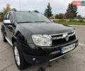 Черный Рено Дастер, объемом двигателя 1.6 л и пробегом 95 тыс. км за 9999 $, фото 2 на Automoto.ua