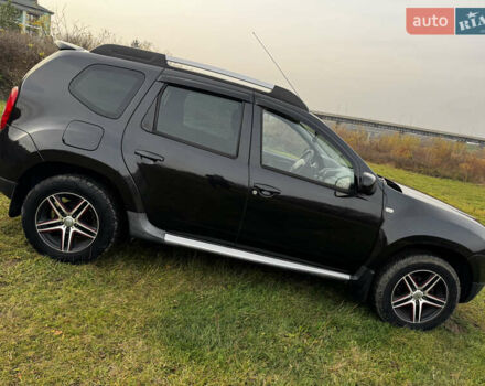 Чорний Рено Дастер, об'ємом двигуна 1.6 л та пробігом 166 тис. км за 9700 $, фото 13 на Automoto.ua