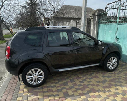 Черный Рено Дастер, объемом двигателя 1.6 л и пробегом 84 тыс. км за 9000 $, фото 2 на Automoto.ua