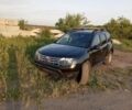 Черный Рено Дастер, объемом двигателя 2 л и пробегом 210 тыс. км за 6100 $, фото 1 на Automoto.ua