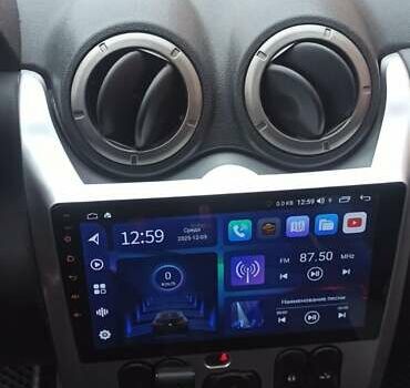 Черный Рено Дастер, объемом двигателя 2 л и пробегом 223 тыс. км за 10500 $, фото 1 на Automoto.ua