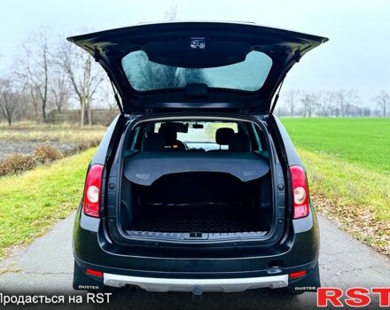 Черный Рено Дастер, объемом двигателя 1.5 л и пробегом 73 тыс. км за 12300 $, фото 12 на Automoto.ua