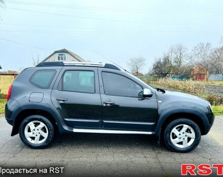 Черный Рено Дастер, объемом двигателя 1.5 л и пробегом 73 тыс. км за 12300 $, фото 1 на Automoto.ua