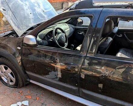 Черный Рено Дастер, объемом двигателя 1.5 л и пробегом 172 тыс. км за 4000 $, фото 1 на Automoto.ua