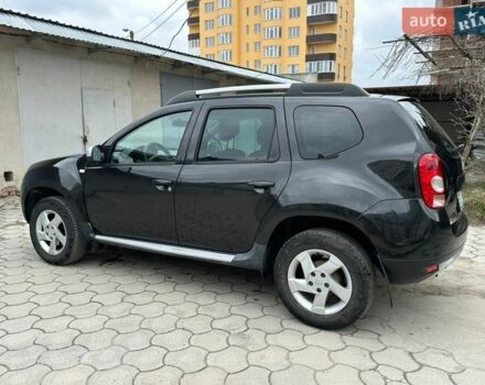 Черный Рено Дастер, объемом двигателя 1.5 л и пробегом 170 тыс. км за 8800 $, фото 1 на Automoto.ua