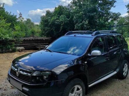 Черный Рено Дастер, объемом двигателя 1.6 л и пробегом 51 тыс. км за 11000 $, фото 1 на Automoto.ua