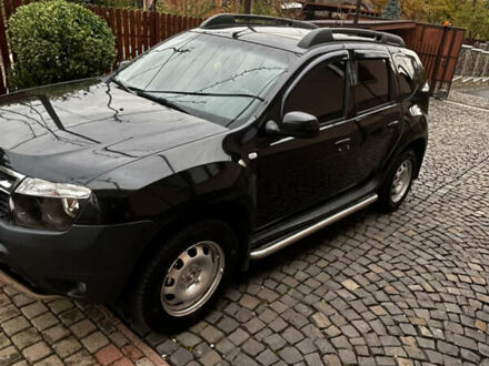 Черный Рено Дастер, объемом двигателя 1.46 л и пробегом 171 тыс. км за 8900 $, фото 1 на Automoto.ua