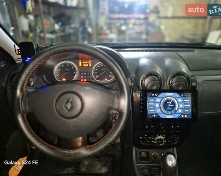 Черный Рено Дастер, объемом двигателя 1.6 л и пробегом 94 тыс. км за 8900 $, фото 1 на Automoto.ua