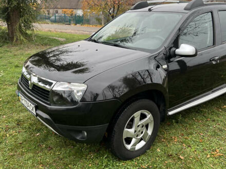 Черный Рено Дастер, объемом двигателя 1.6 л и пробегом 144 тыс. км за 9300 $, фото 1 на Automoto.ua