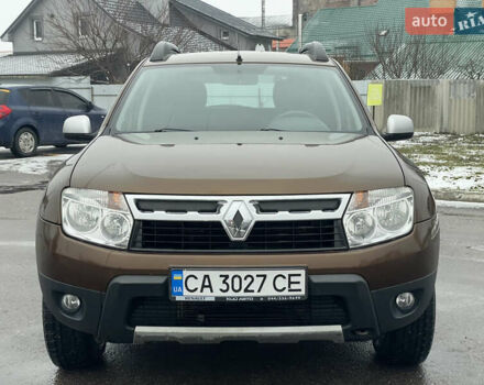 Коричневый Рено Дастер, объемом двигателя 1.6 л и пробегом 113 тыс. км за 9850 $, фото 2 на Automoto.ua