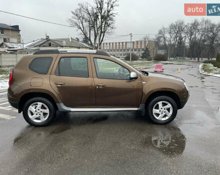 Коричневый Рено Дастер, объемом двигателя 1.6 л и пробегом 113 тыс. км за 9850 $, фото 4 на Automoto.ua