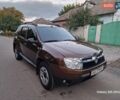 Коричневый Рено Дастер, объемом двигателя 1.6 л и пробегом 267 тыс. км за 5600 $, фото 1 на Automoto.ua