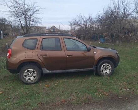 Коричневый Рено Дастер, объемом двигателя 1.6 л и пробегом 230 тыс. км за 7000 $, фото 4 на Automoto.ua