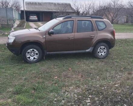 Коричневый Рено Дастер, объемом двигателя 1.6 л и пробегом 230 тыс. км за 7000 $, фото 3 на Automoto.ua