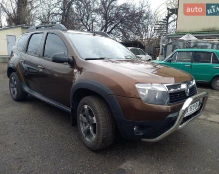 Коричневый Рено Дастер, объемом двигателя 1.46 л и пробегом 188 тыс. км за 9200 $, фото 1 на Automoto.ua