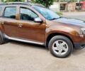 Коричневый Рено Дастер, объемом двигателя 1.6 л и пробегом 172 тыс. км за 9990 $, фото 1 на Automoto.ua