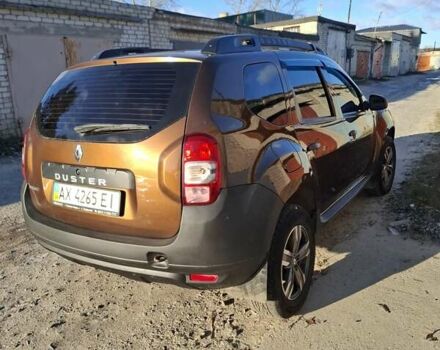 Коричневый Рено Дастер, объемом двигателя 1.45 л и пробегом 142 тыс. км за 10500 $, фото 2 на Automoto.ua