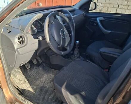 Коричневый Рено Дастер, объемом двигателя 1.45 л и пробегом 142 тыс. км за 10500 $, фото 4 на Automoto.ua